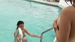 Lovely topless lesbian exotic girls love to strip their big tits bare outside