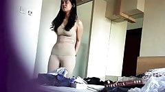 Spy Cam. Sexy Asian girl changing in bedroom